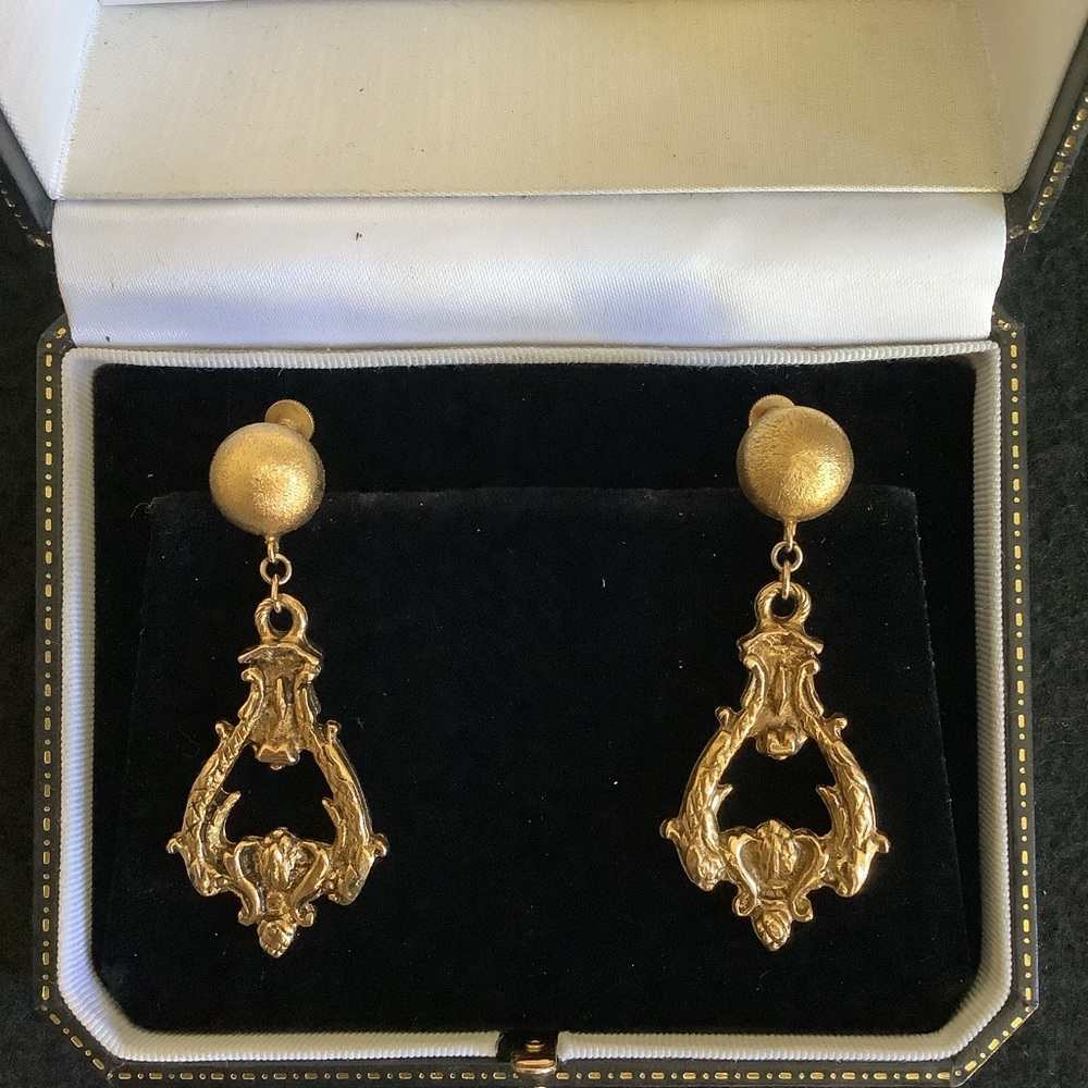 Vintage RISA gold tone clip on earrings.